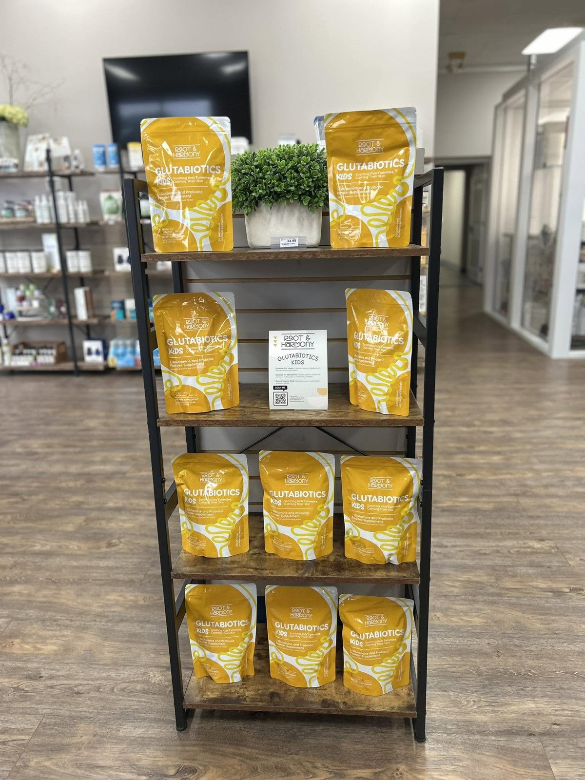 Glutabiotics Kids pouches on a retail display stand at Tide Wellness in Northport, Alabama